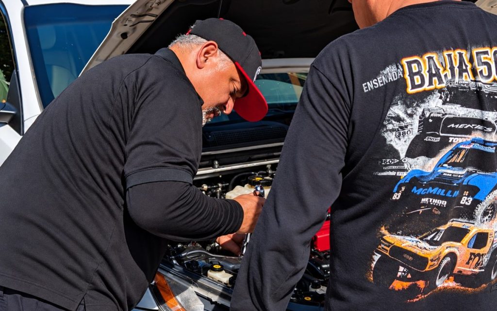 Close-up of a technician working on an engine